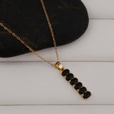 Gold - Plated Black Onyx Oval Gemstones Vertical Design Pendant Necklace