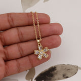 Gold - Plated Flower Pendant Necklace with Cubic Zirconia Gemstones Elegant Floral Jewelry