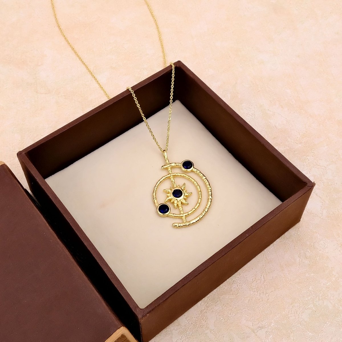 Celestial Sunburst Pendant Necklace with Faceted pink fuchsia in Gold Plated 5403